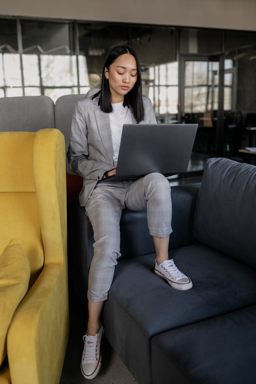 woman in gray blazer using gray laptop,  Overseeing And Recruiting Affiliates