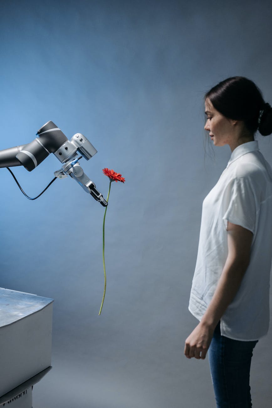 a robot giving a woman a flower , 2023 predictions