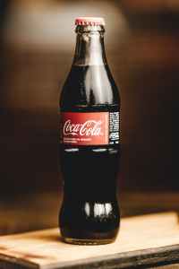 coca cola glass bottle macro photography
