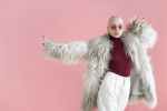 fashionable woman in fur coat dancing in studio trends 2023