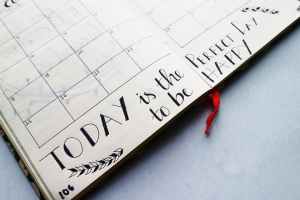 writings in a planner Top 10 Time Management Strategies